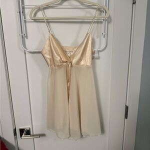 Vintage Victoria secret slip nightgown in a butter yellow ivory color